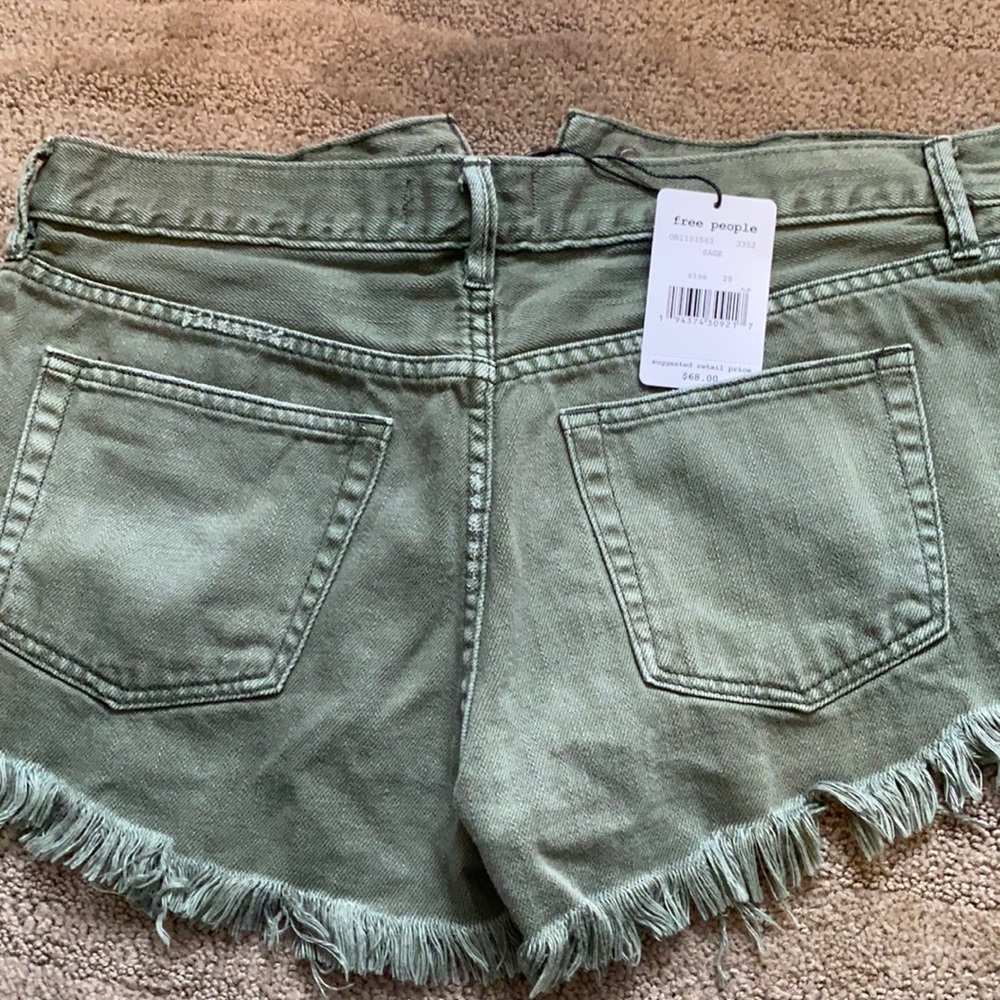 Free people sage green denim shorts. Size 28